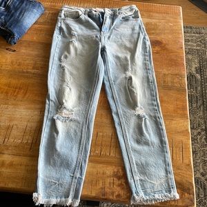 Mom fit KanCan size 26 light wash distressed jean.